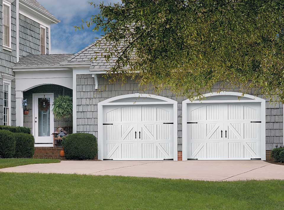Amarr Carriage House garage door with lucern design with closed arch in true white