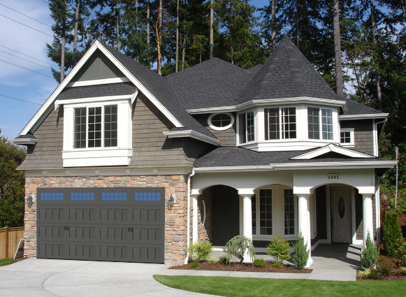 Amarr single garage door with recessed panels and thames window inserts in charcoal gray