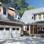 How much does it cost to replace a garage door?